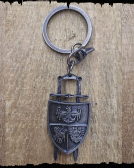 Brelok, tarcza i dwa miecze.